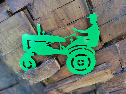 Man on a Tractor - Cutting Edge Design LLC